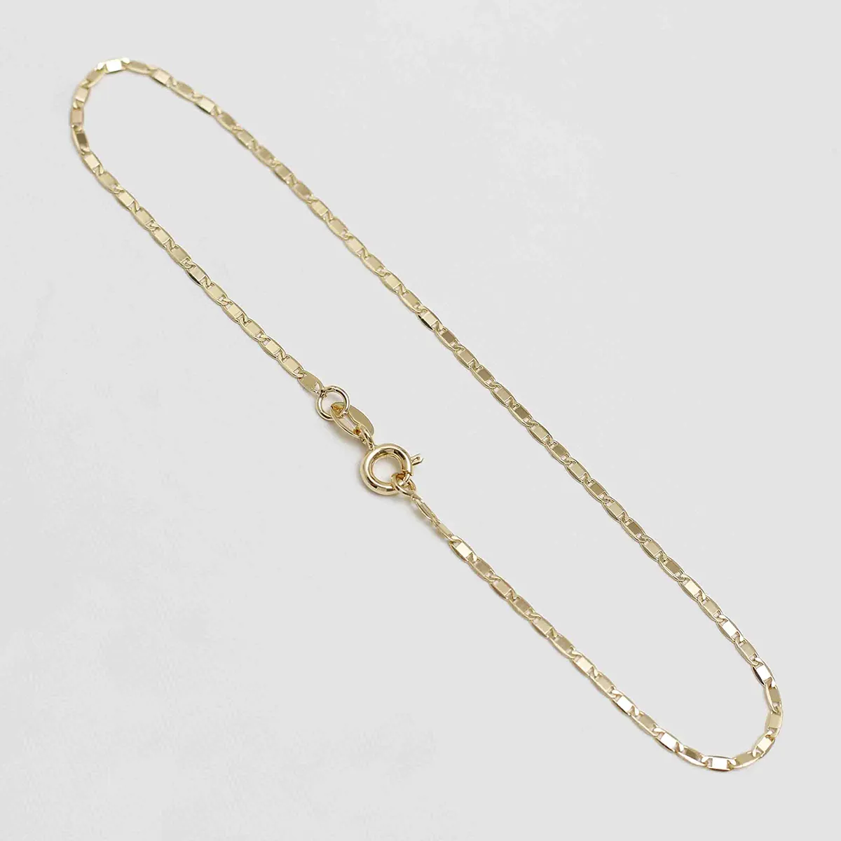 Tobillera Escalera Delgada Plana Lisa 24.5 cm en Oro Laminado de 18k | Qurimaki Tobillera Escalera Delgada Plana Lisa 24.5 cm en Oro Laminado de 18k | Qurimaki