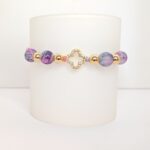 PA006 – Pulsera Clover con Circonia en Macramé Rosa y Lila